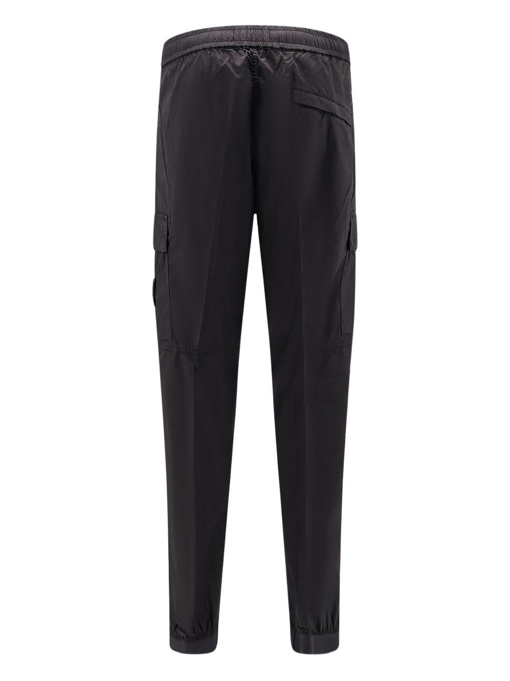 STONE ISLAND Pantaloni neri con patch logo e tasche