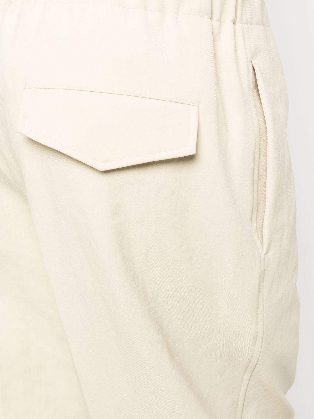 JIL SANDER Pantaloni beige con vita elasticizzata