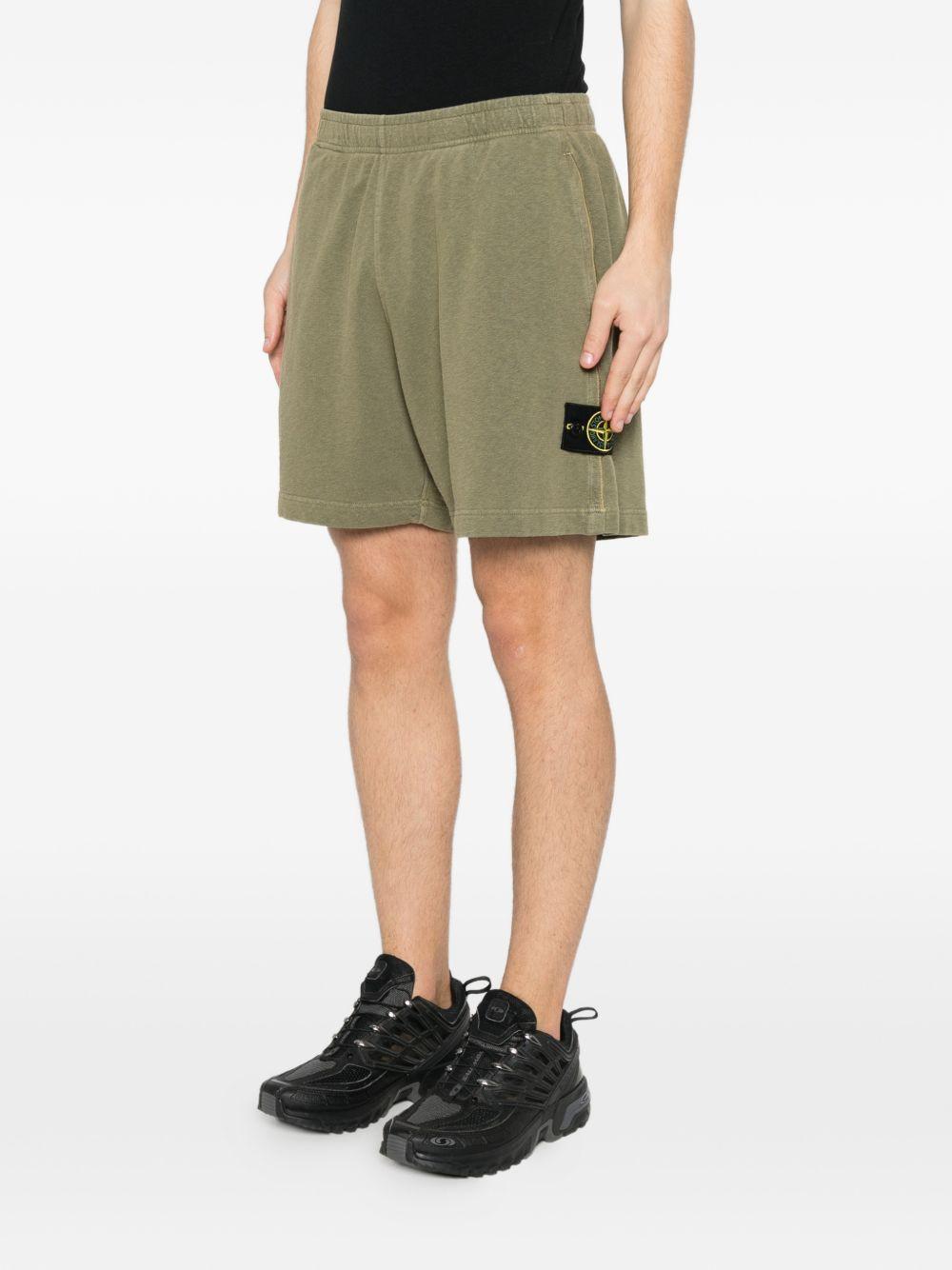 STONE ISLAND Shorts in cotone verde con patch logo