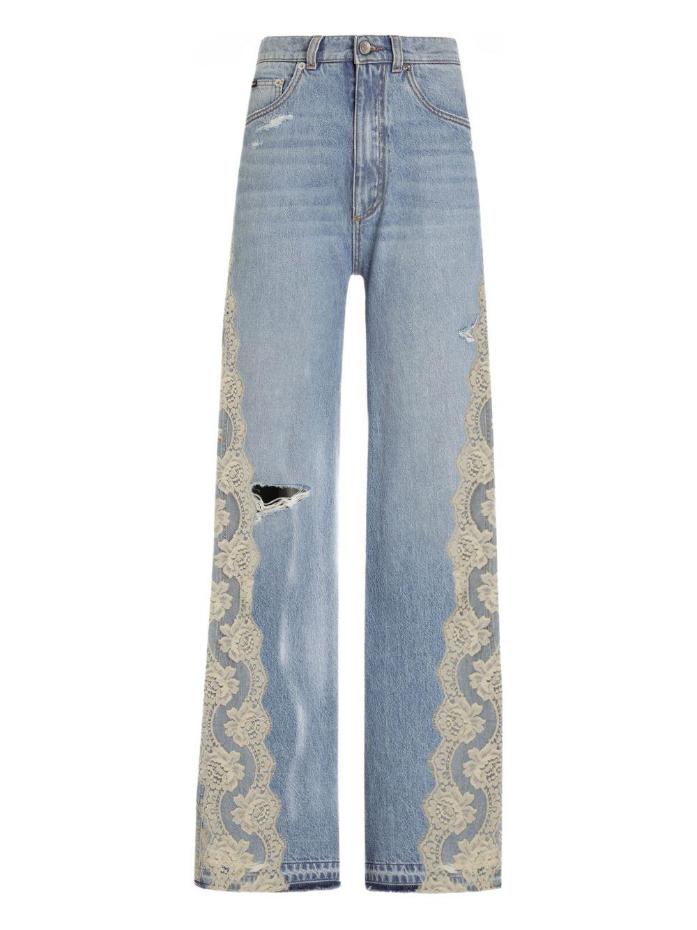 DOLCE e GABBANA Jeans lunghi con strappo e pizzo bianco