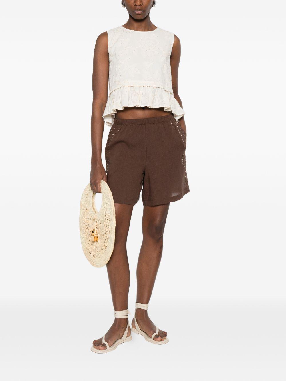 LIUJO Top in san gallo con rouches in vita