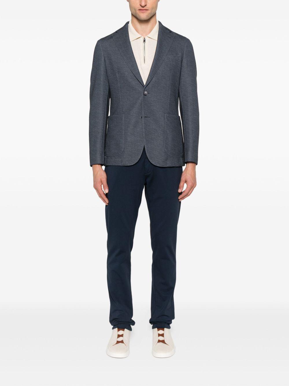 BOSS Polo con zip color avorio