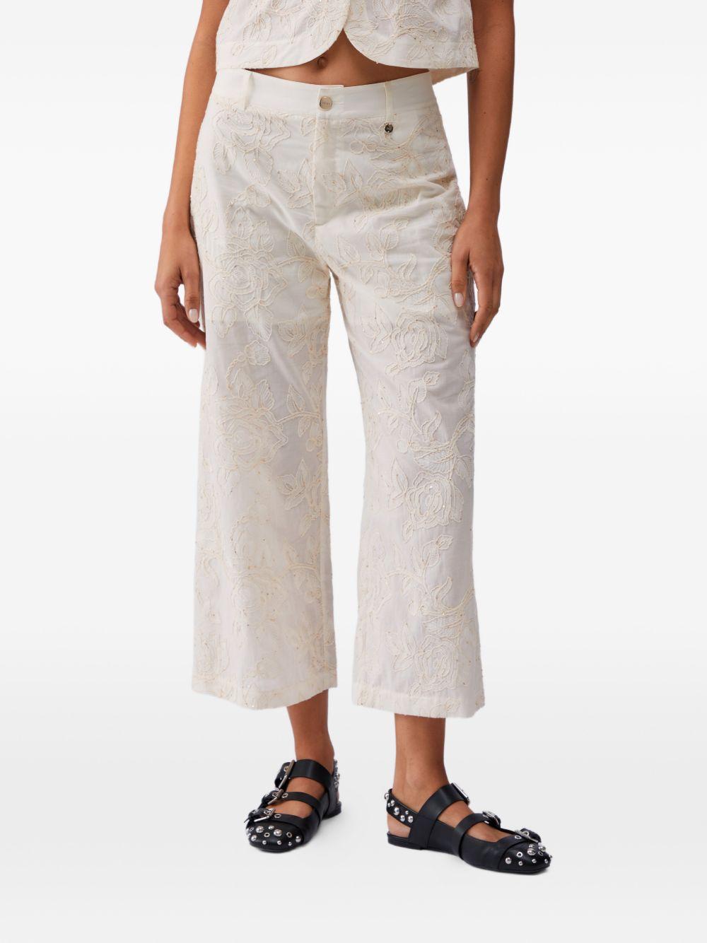 LIUJO Pantaloni con ricami floreali in rilievo bianchi