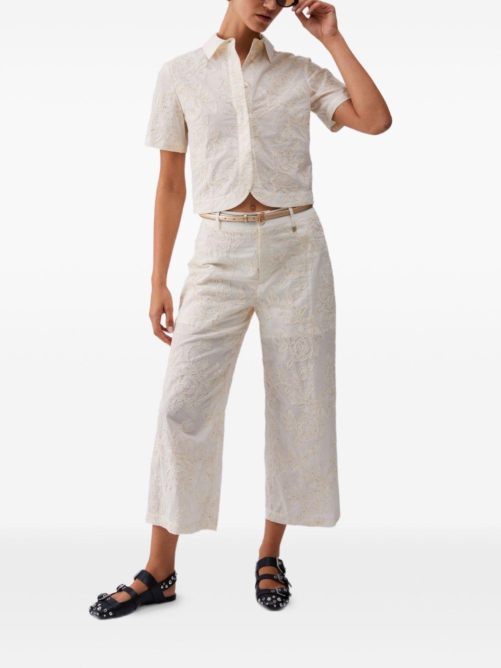 LIUJO Pantaloni con ricami floreali in rilievo bianchi