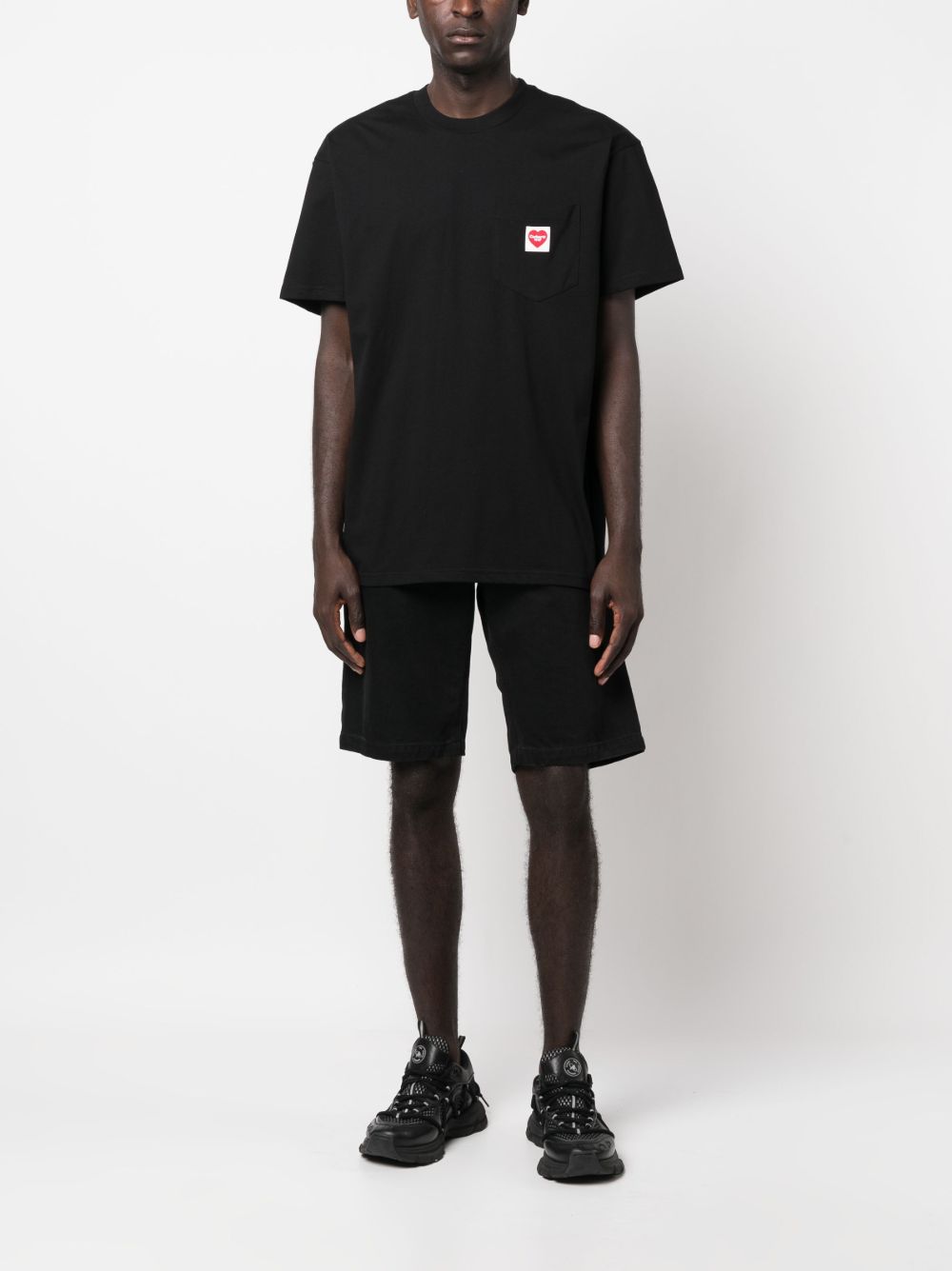 CARHARTT WIP T-shirt in cotone nero con tasca e logo cuore 