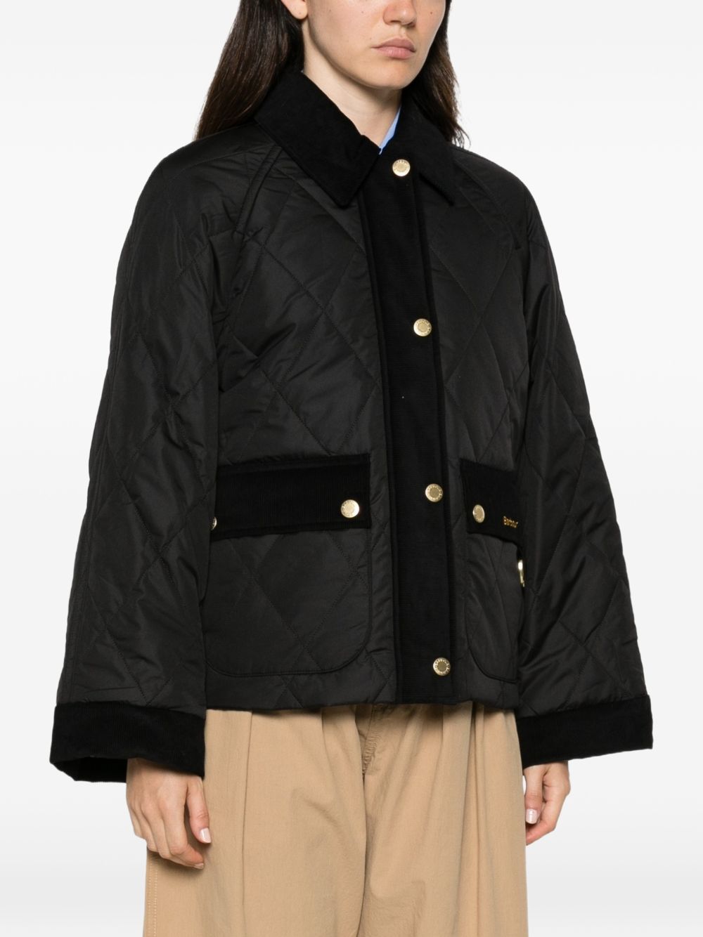 BARBOUR Giubbotto nero trapuntato con dettagli in velluto e tasche 