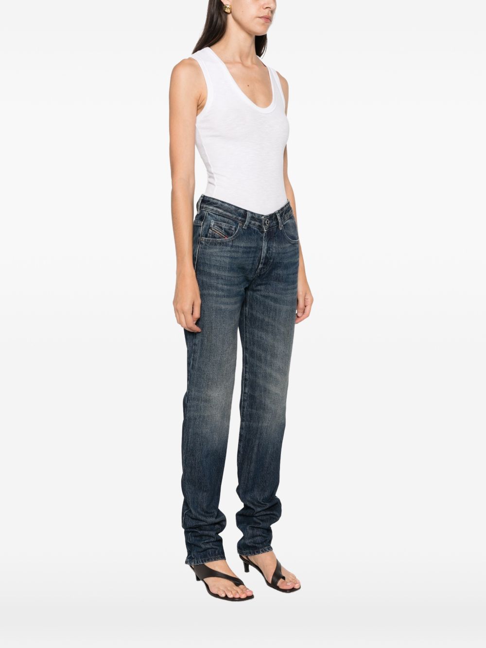 DIESEL Jeans blu con effetto washed sulla coscia e tasche 