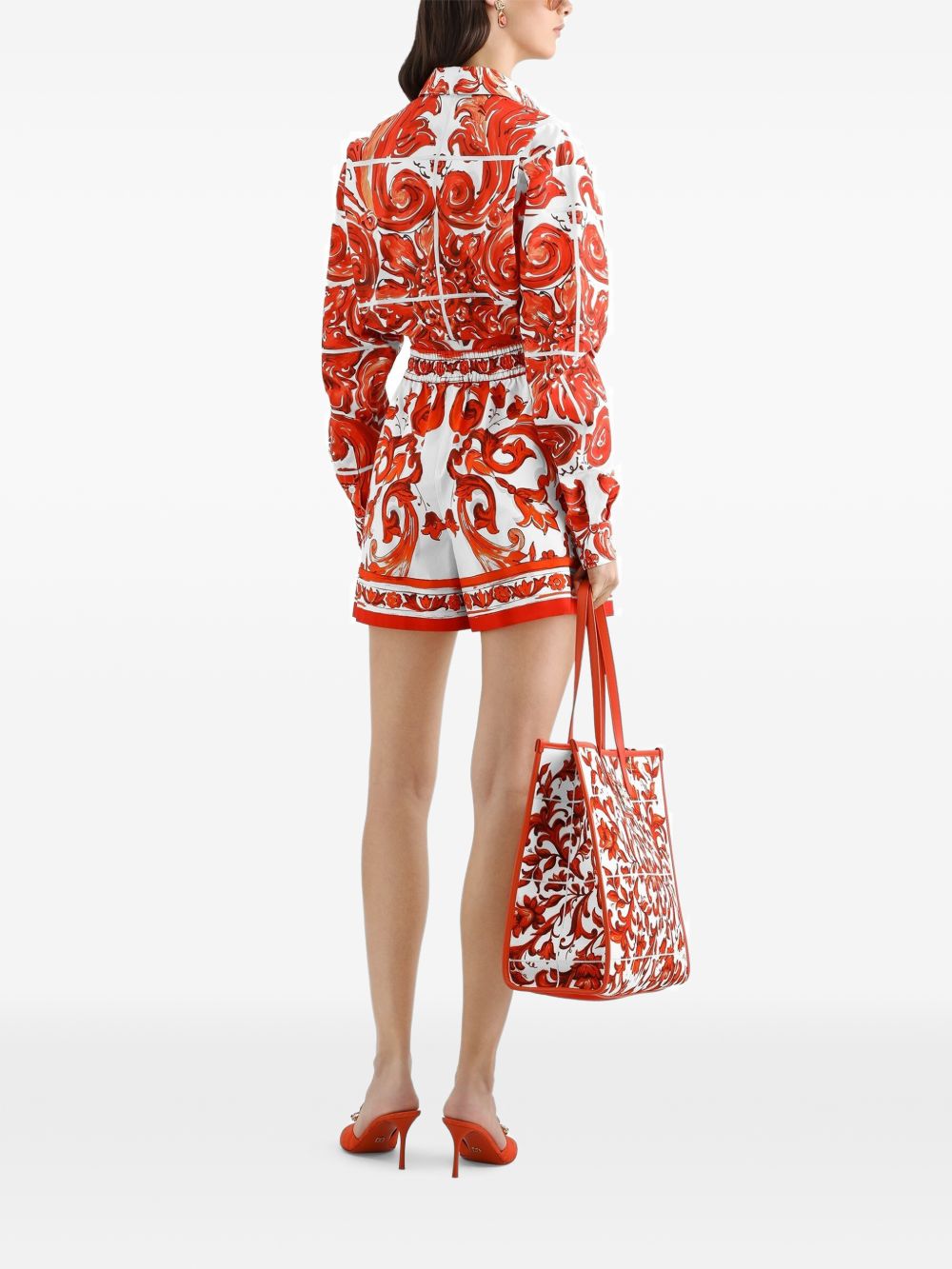 DOLCE e GABBANA Shorts in cotone arancione con stampa grafica 