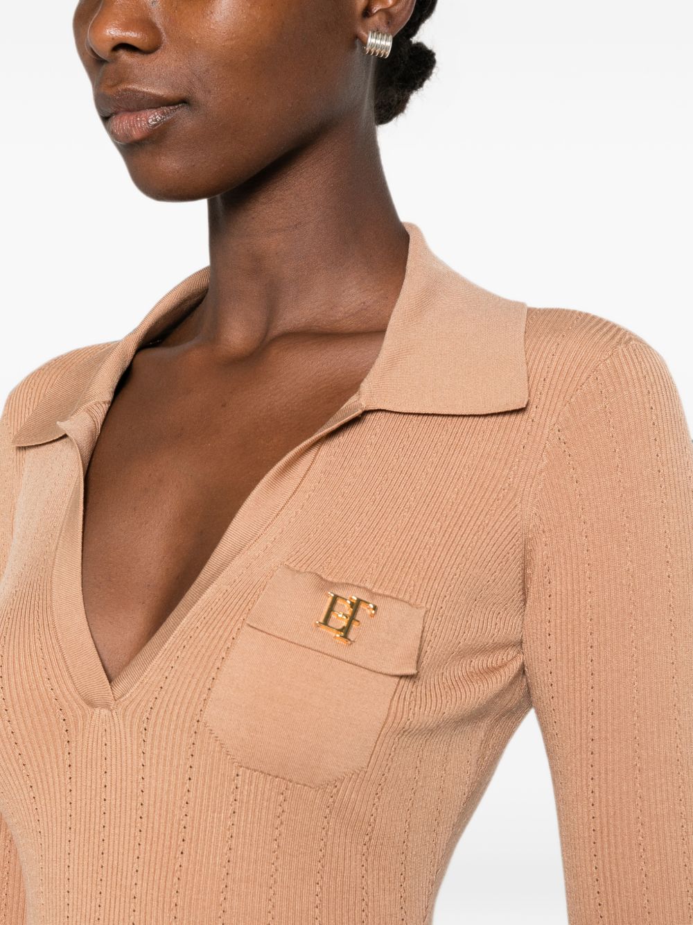 ELISABETTA FRANCHI Body rosa cipria con scollo a V e taschino frontale 