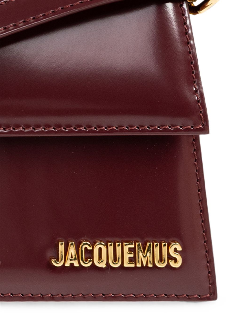 JACQUEMUS Borsa Le Grand Bambino bordeaux in pelle lucida con logo dorato 