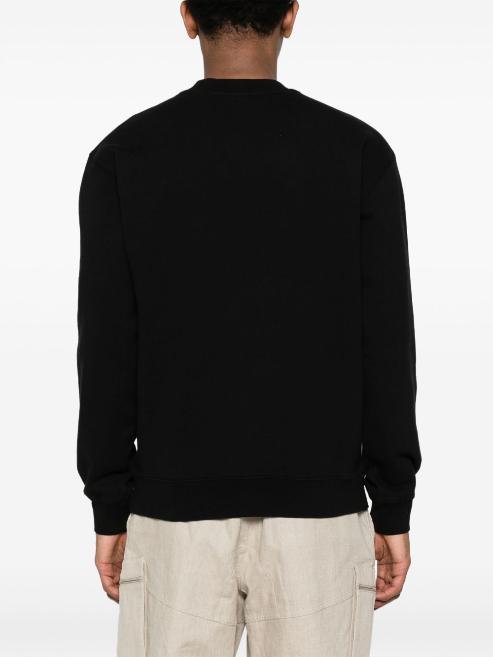JACQUEMUS Felpa nera in cotone con patch logo sul petto 