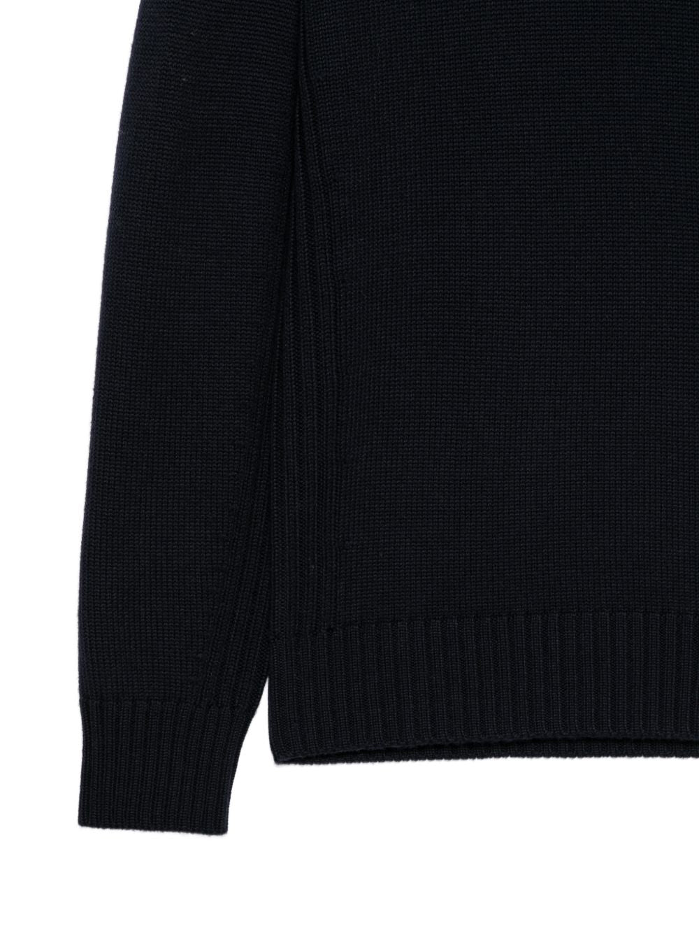 KANGRA Maglia nera a collo alto in lana vergine 