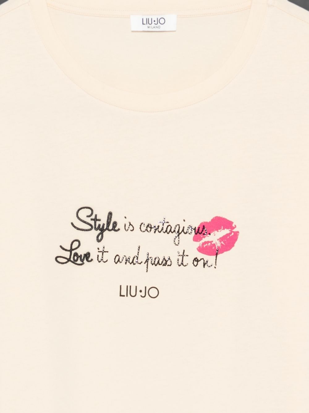 LIUJO T-shirt panna a maniche corte con stampa grafica 