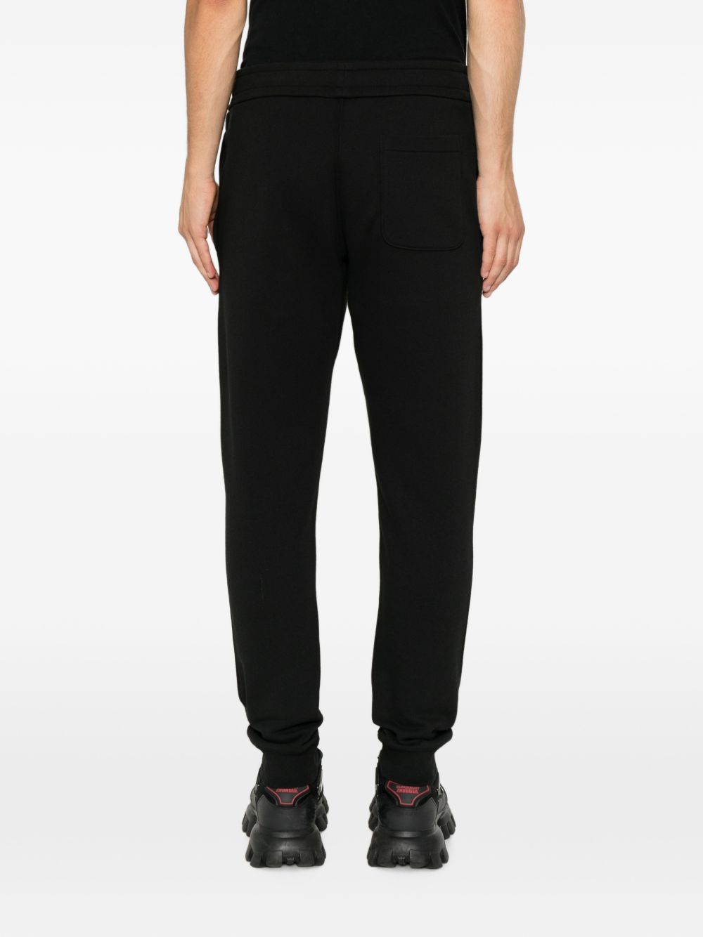 MONCLER Pantaloni sportivi neri in cotone con patch logo 