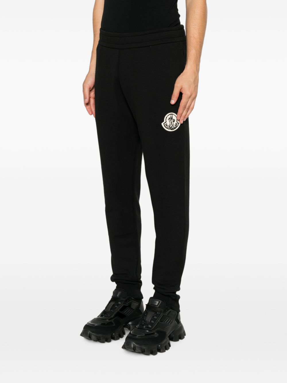 MONCLER Pantaloni sportivi neri in cotone con patch logo 