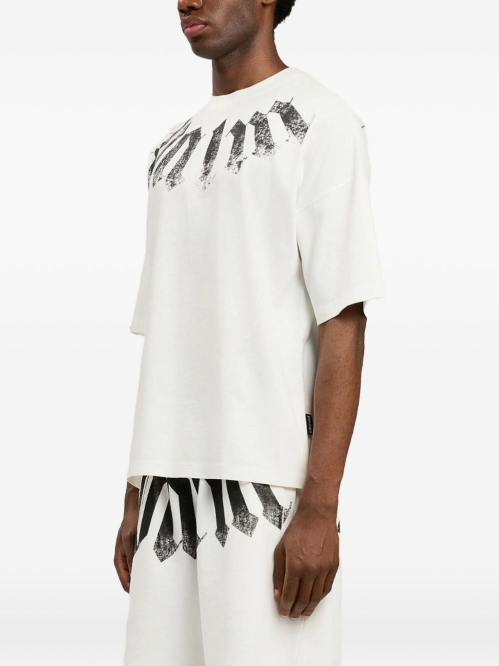 PALM ANGELS T-shirt bianca a maniche over 3/4 con stampa nera 
