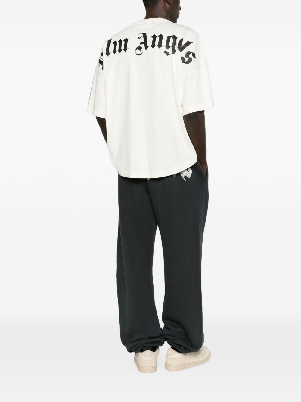 PALM ANGELS T-shirt minimal bianca a maniche 3/4 con logo sul girocollo 
