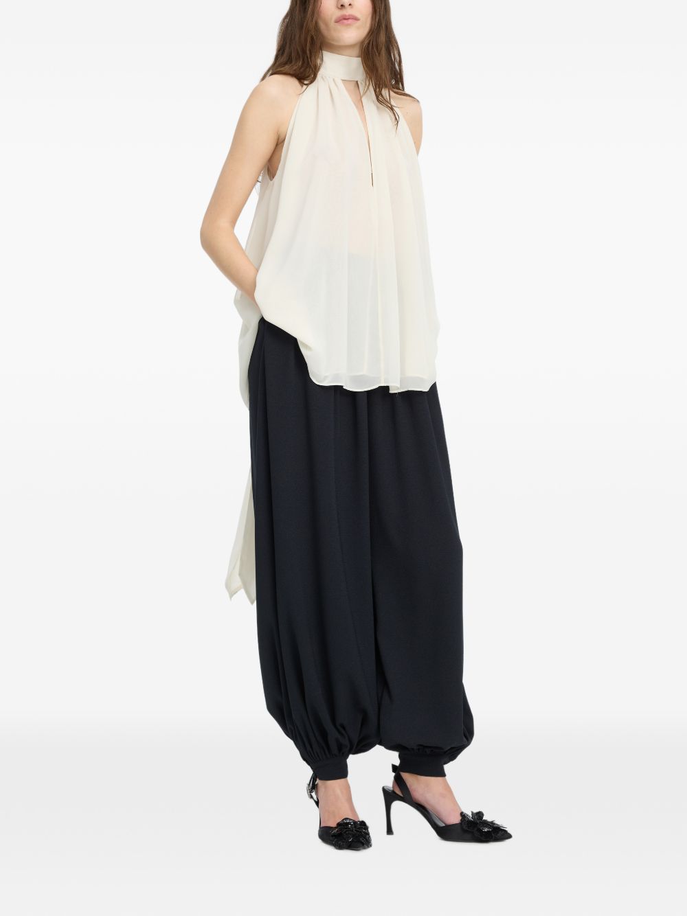 ROTATE Top panna con scollo halter e dettaglio cut-out 
