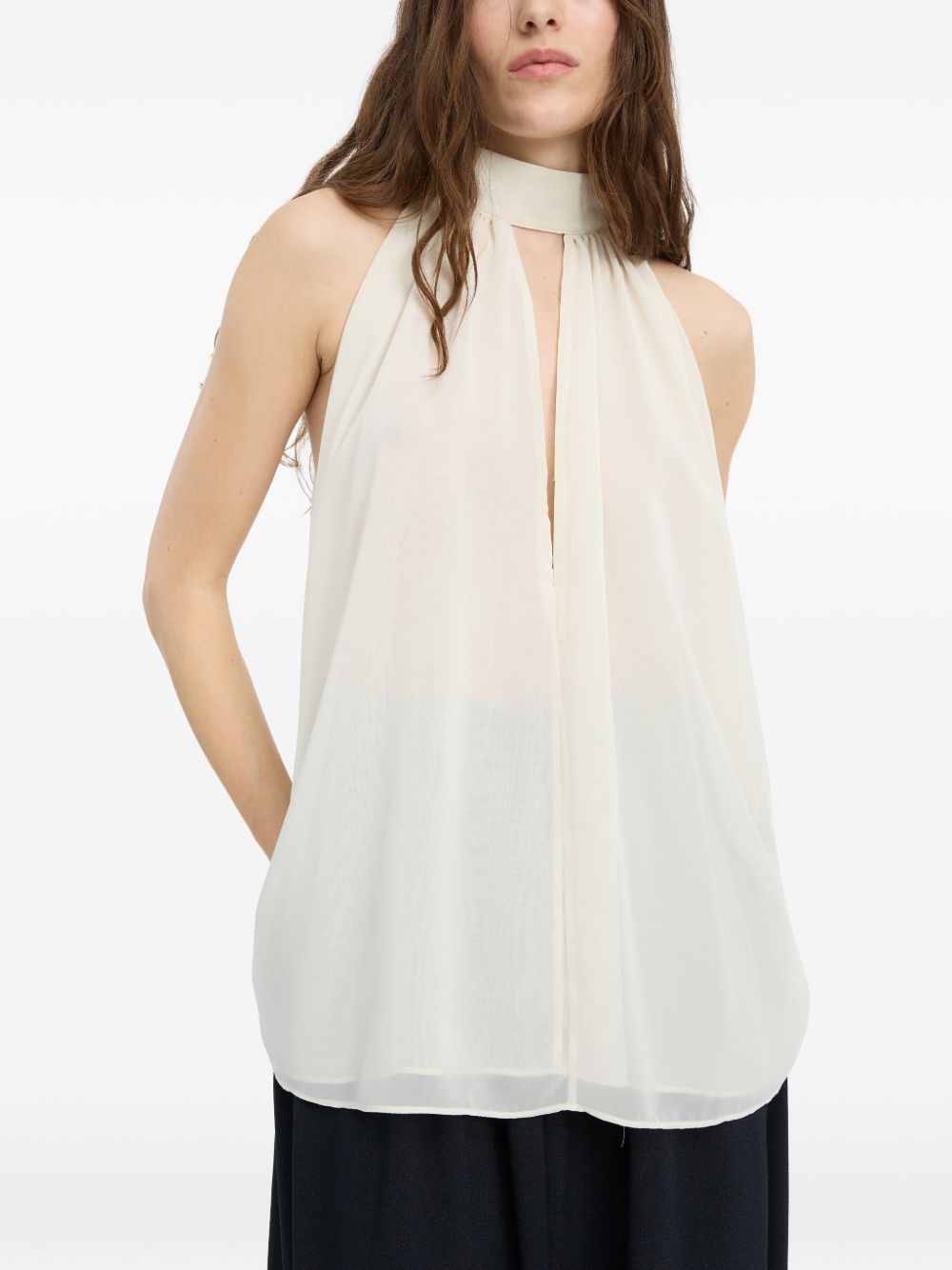 ROTATE Top panna con scollo halter e dettaglio cut-out 