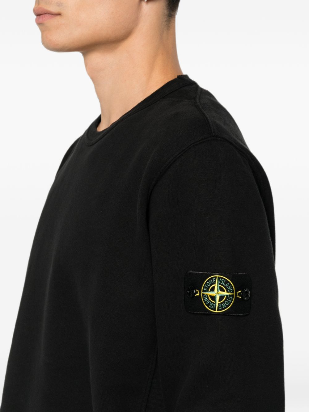 STONE ISLAND Felpa nera in cotone a girocollo con patch logo 