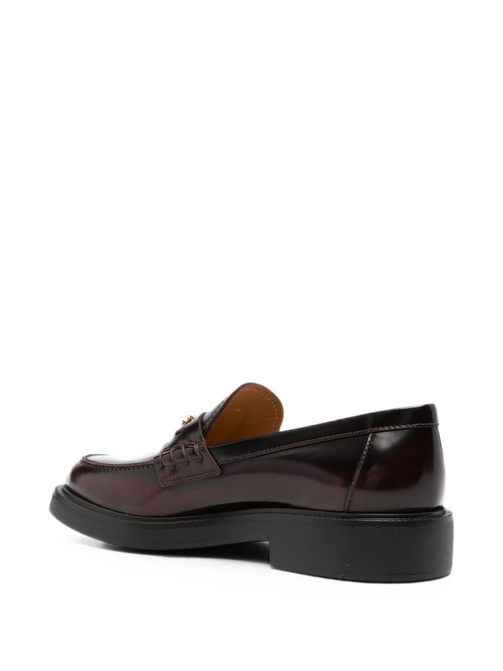 TODS Mocassini in pelle lucida bordeaux con placca logo dorata 