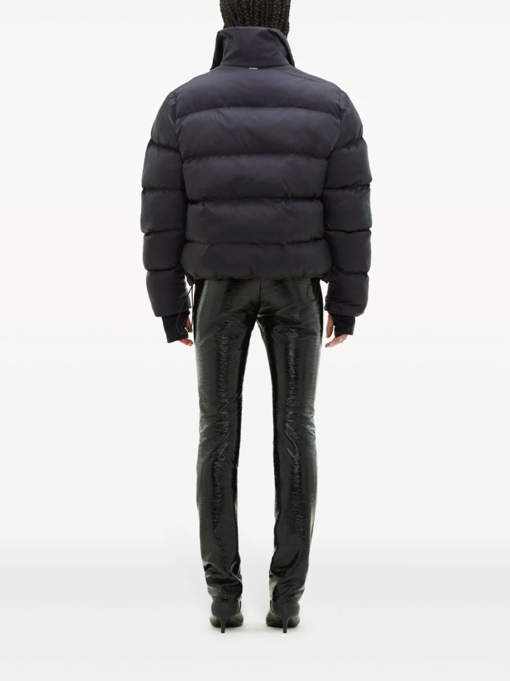 COURREGES Piumino nero con coulisse in vita e tasche laterali 