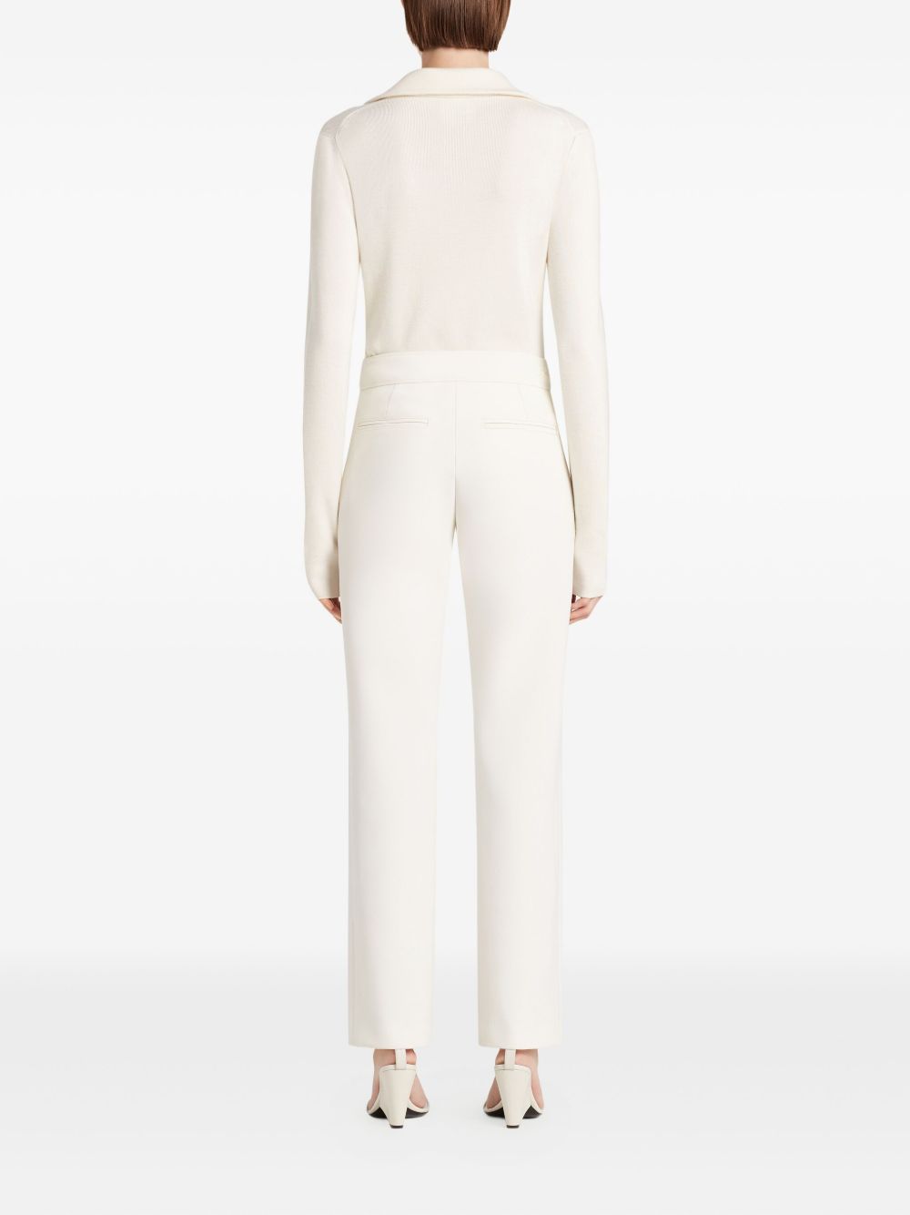 COURREGES Polo bianca con chiusura a zip sul collo 
