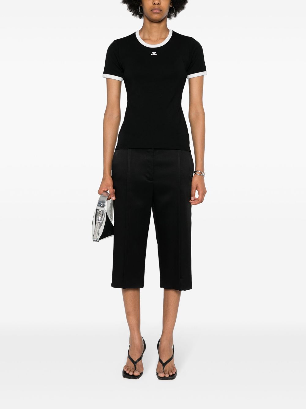 COURREGES T-shirt slim nera con rifiniture bianche 