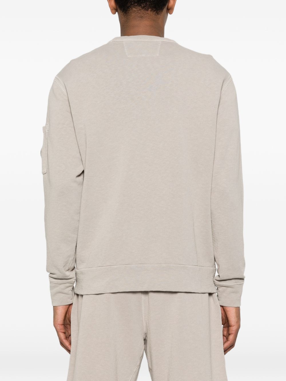 CP COMPANY Felpa girocollo con patch logo sulla manica 