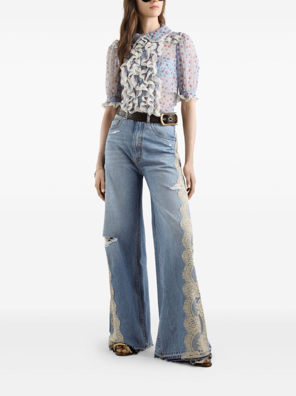 DOLCE e GABBANA Jeans lunghi con strappo e pizzo bianco 