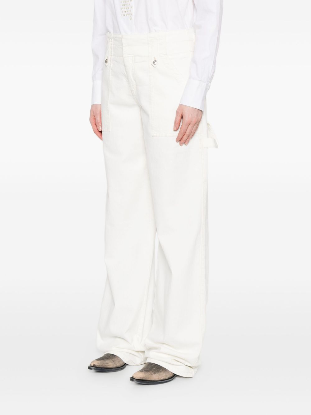 ERMANNO SCERVINO Jeans con decorazione occhielli 
