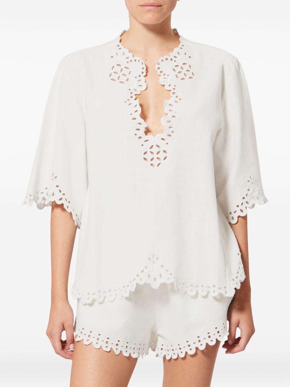 MARANT ETOILE Blusa bianca a maniche corte con scollo a V e orlo smerlato 