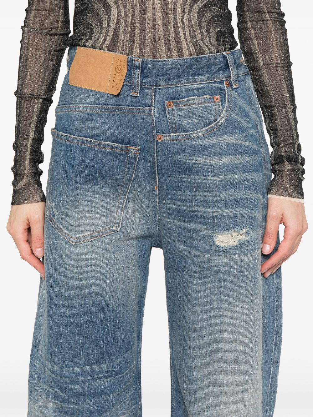 MM6 MAISON MARGIELA Jeans lunghi a gamba larga effetto wash 