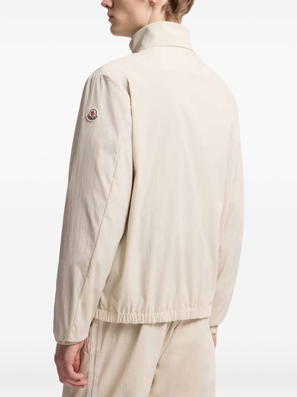 MONCLER Giacca beige con taschino esterno e chiusura a zip 