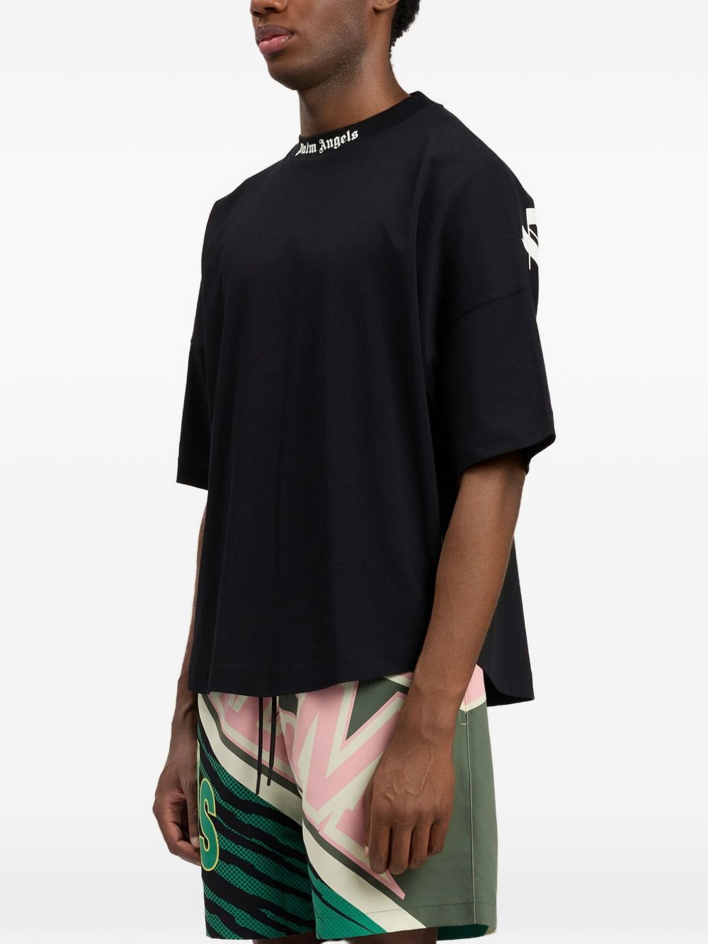 PALM ANGELS T-shirt svasata nera con logo bianco 