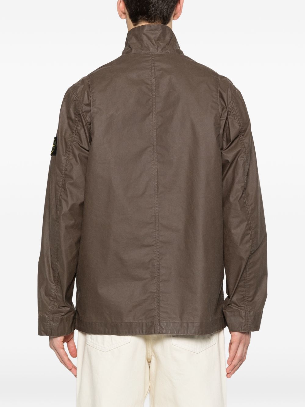 STONE ISLAND Giacca cerata marrone scuro con logo 