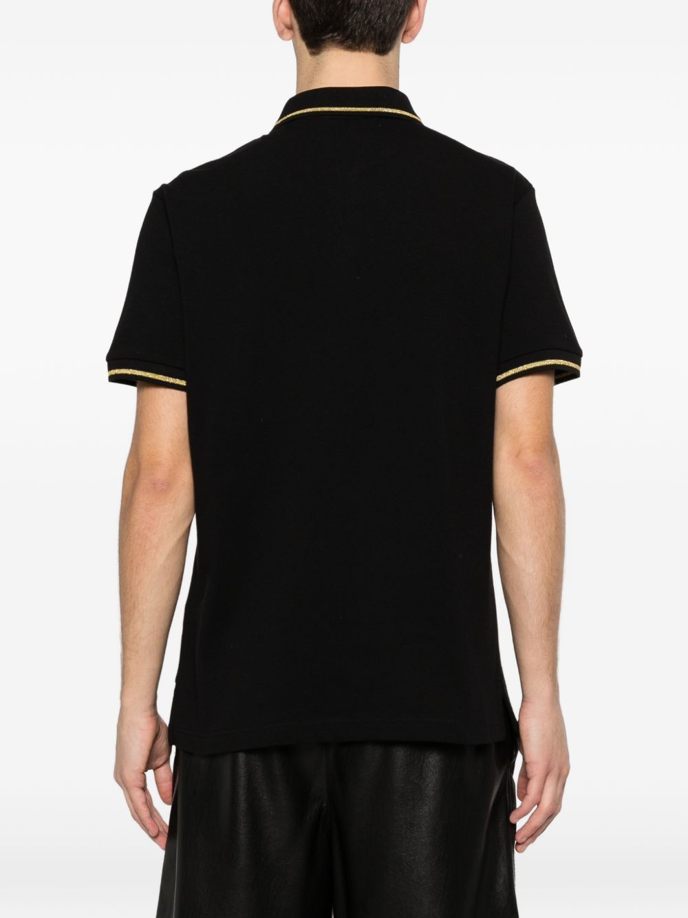 VERSACE JEANS COUTURE Polo nera con bordo a coste e logo 