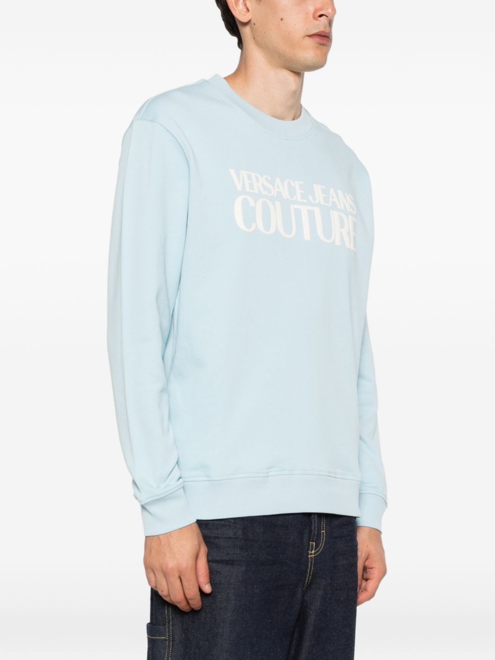 VERSACE JEANS COUTURE Felpa in cotone celeste girocollo con logo bianco 