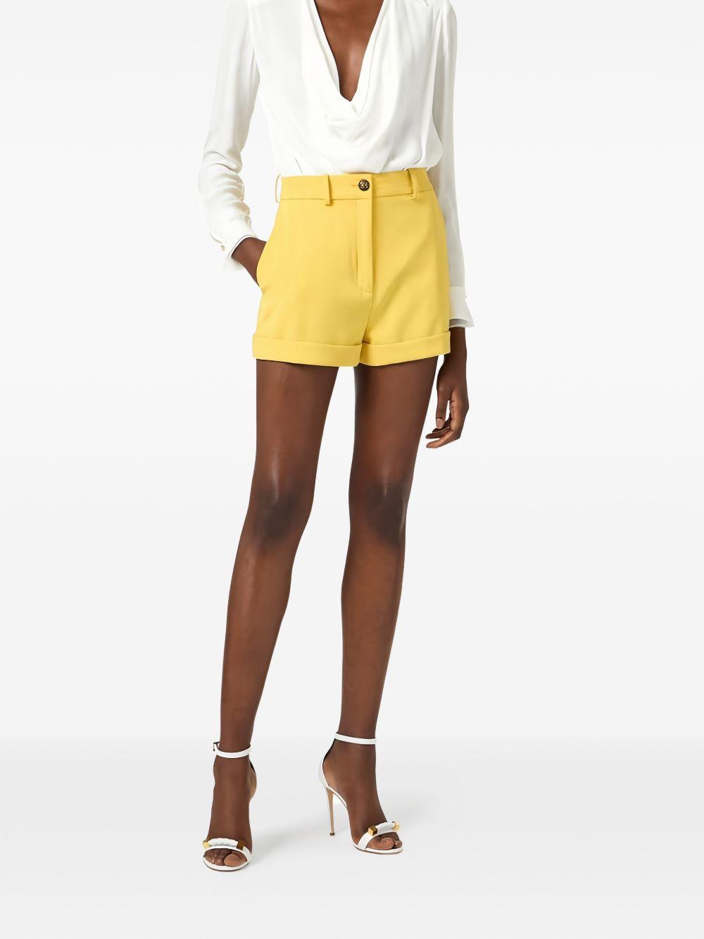 ELISABETTA FRANCHI Camicia corta bianca con collo a V 