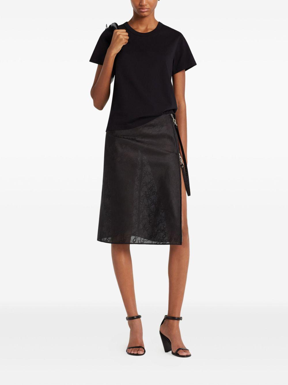 COURREGES T-shirt nera con logo sul petto 