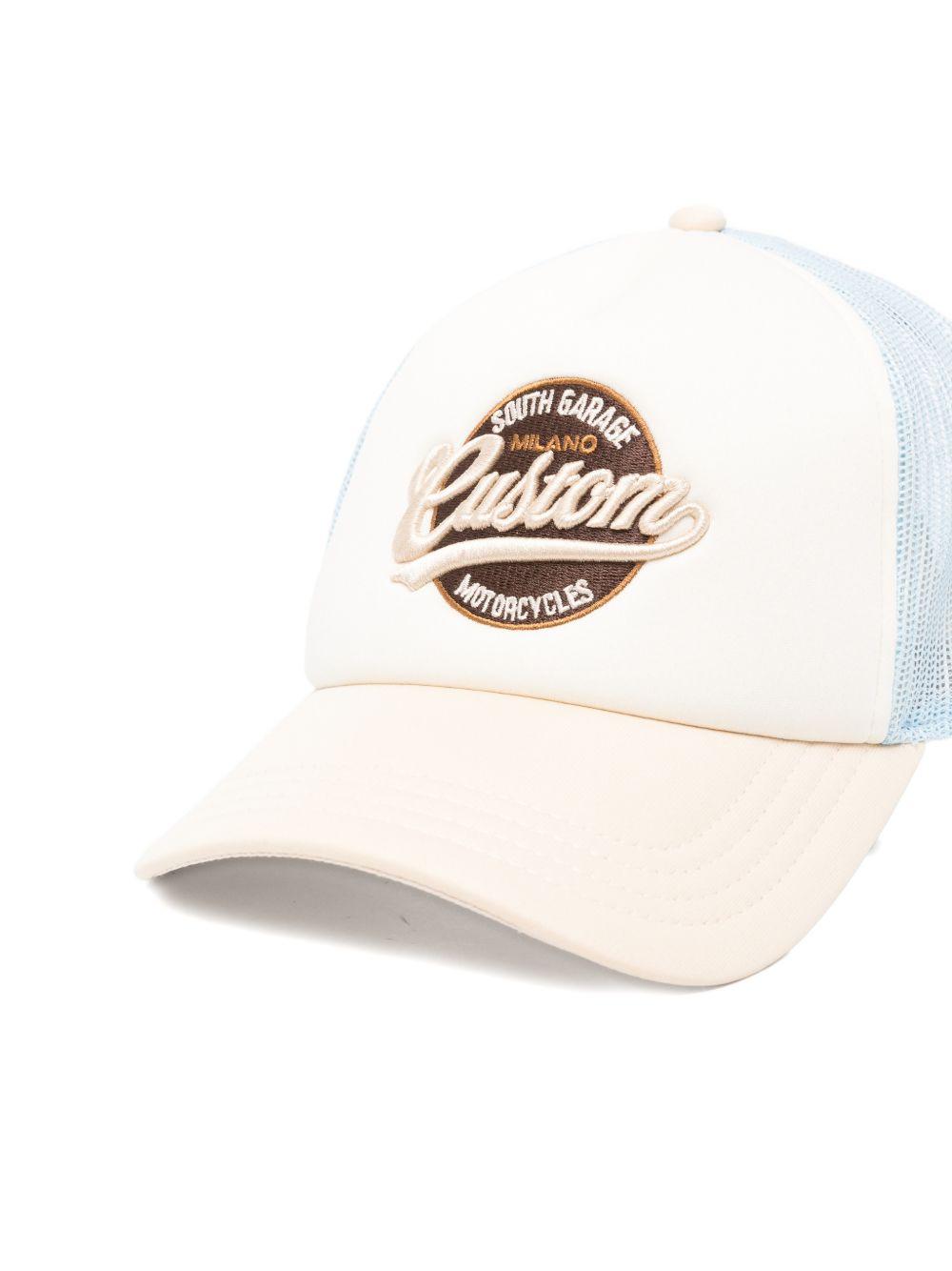 SOUTH GARAGE Cappello da baseball celeste e bianco con stampa 