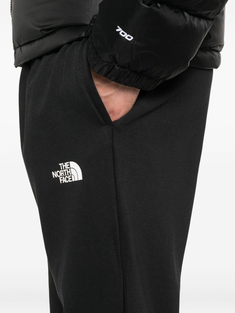 THE NORTH FACE Pantaloni jogger neri con logo 