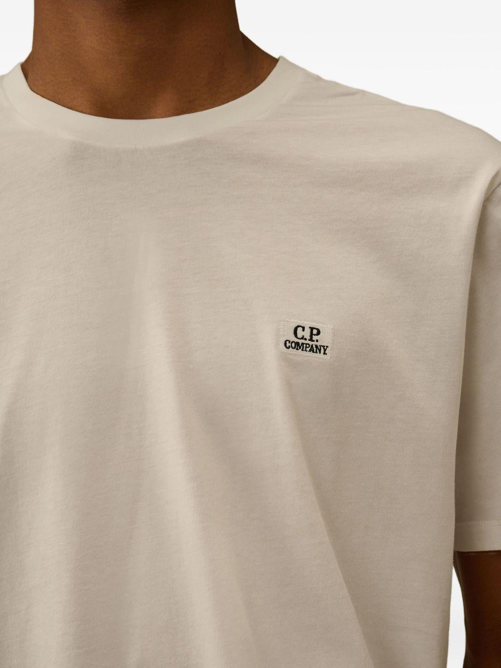 CP COMPANY T-shirt in cotone beige con logo 