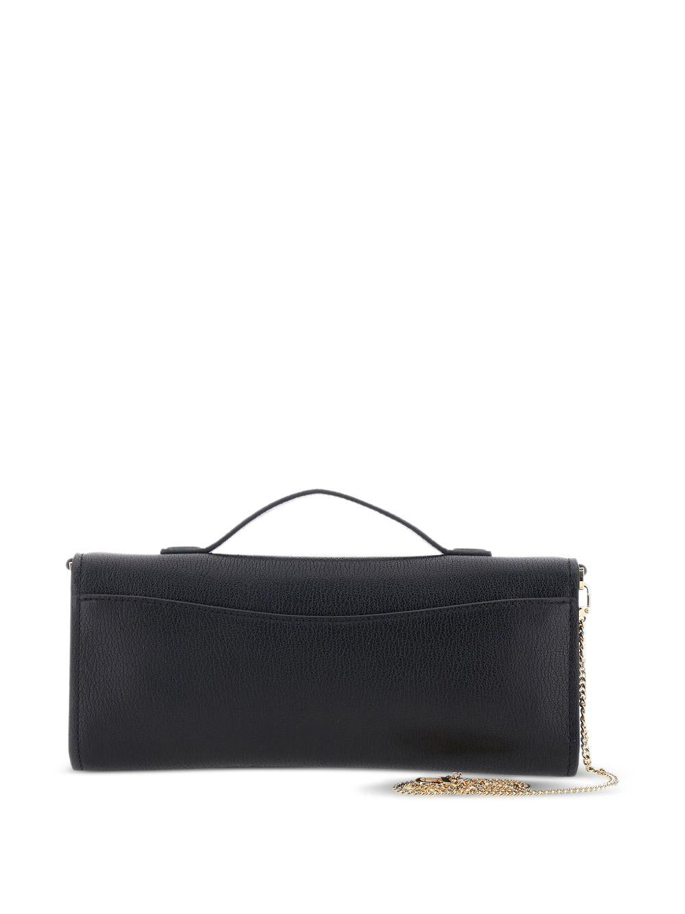 MICHAEL KORS Clutch 'Hamilton Moderne' in pelle nera con lucchetto 