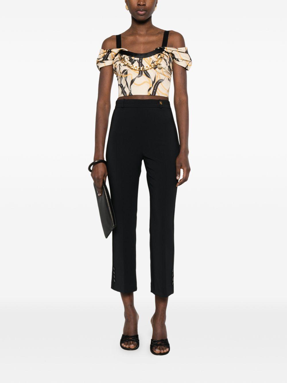 ELISABETTA FRANCHI Top con stampa grafica beige e nero con detagglio a catena 