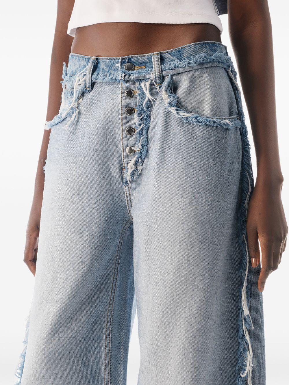 ALEXANDER WANG Jeans lunghi balloon azzurro chiaro in cotone con dettagli sfrangiati 
