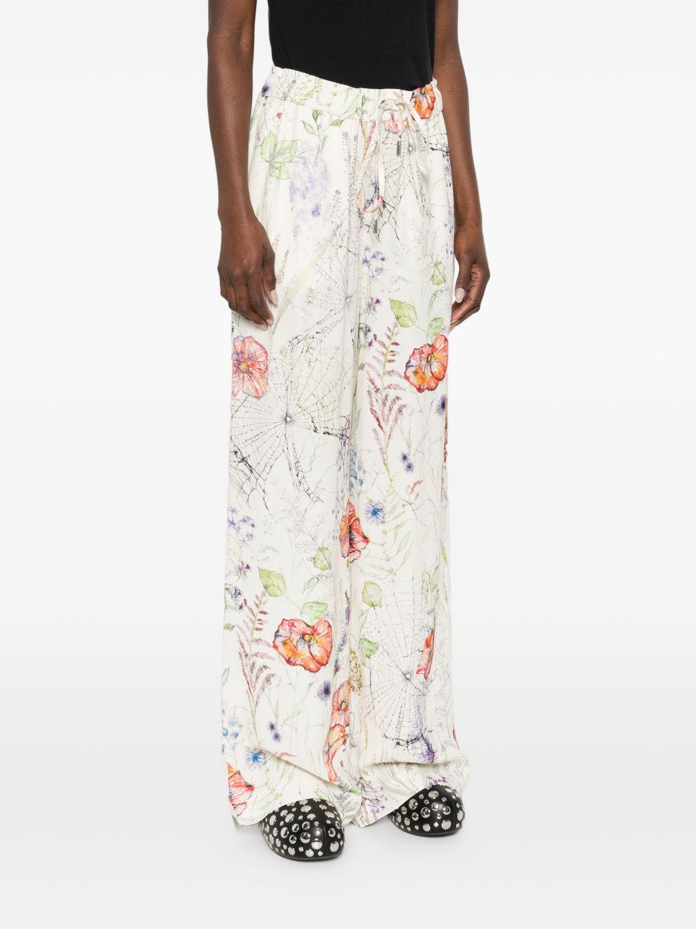 ALEXANDER McQUEEN Pantaloni in cotone con fantasia floreale 
