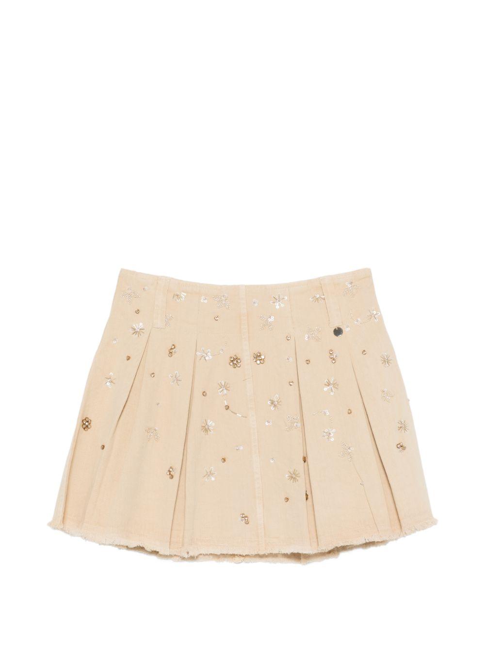 LIUJO Gonna corta in cotone beige con strass 