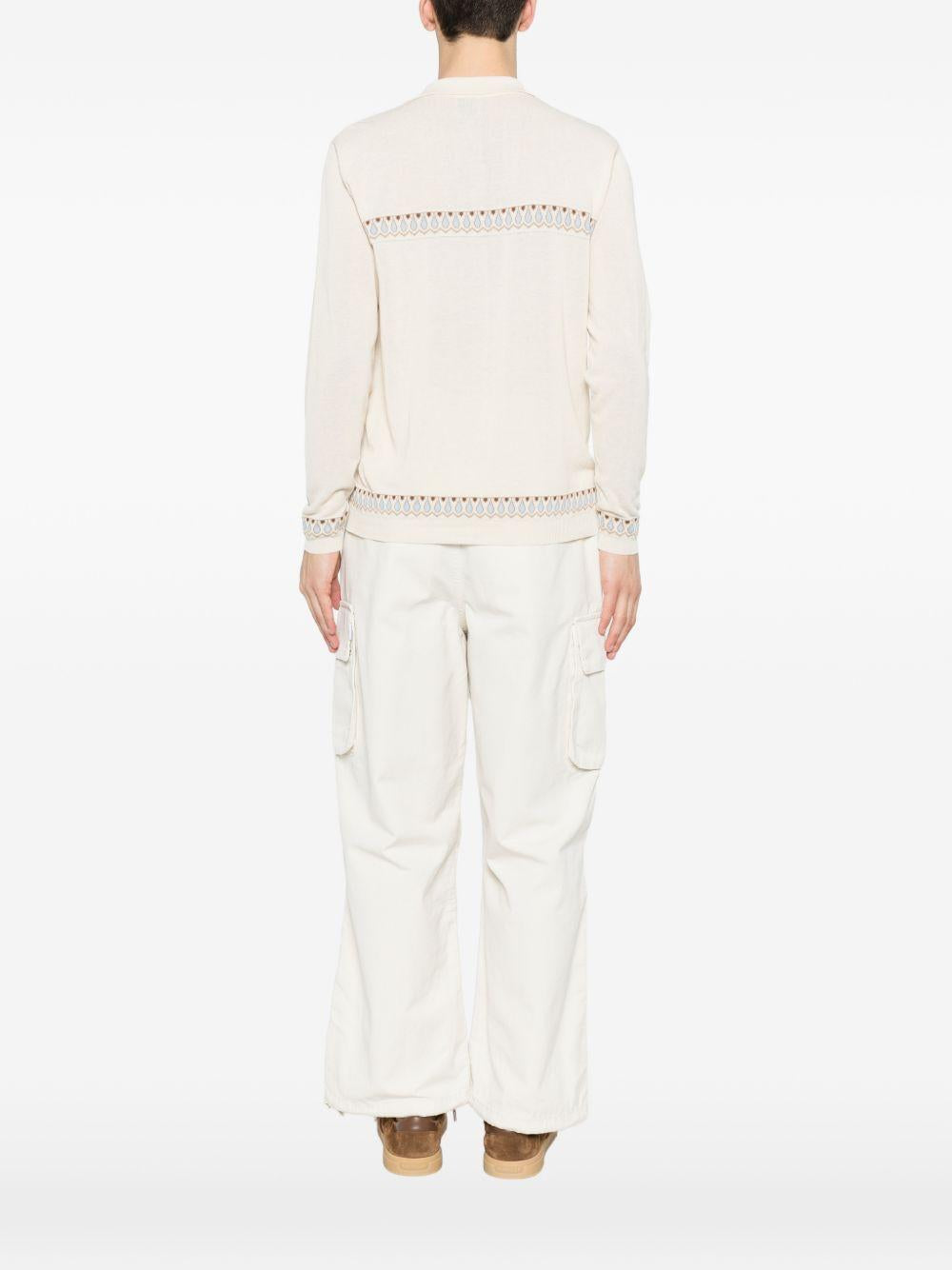 RAKKI Polo in cotone bianco con fantasia a maniche lunghe 