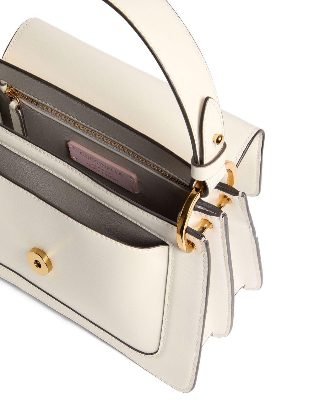 COCCINELLE Borsa a mano in pelle bianca con placca logo 